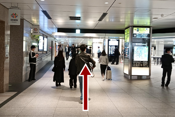 Go straight ahead after exiting the ticket gate.